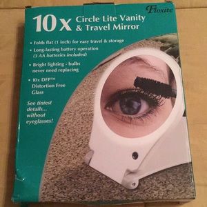 10X Light Up Travels Vanity Mirror. Brand new in box never used.